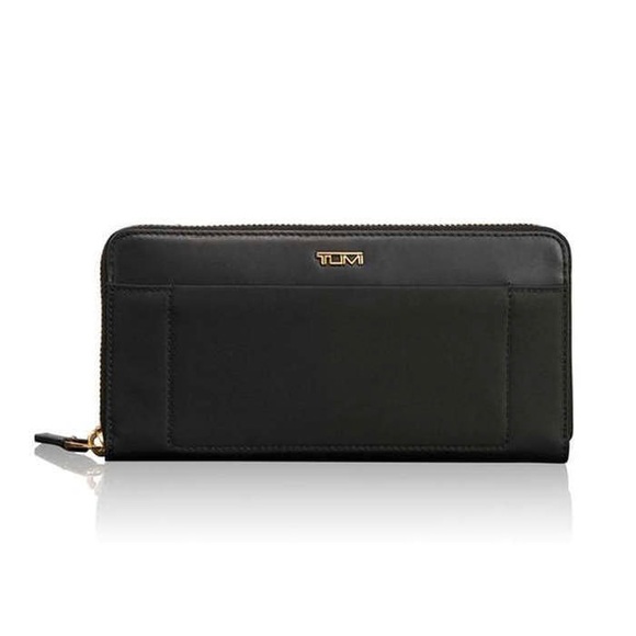Tumi Handbags - Tumi Black Leather Clutch with Gold Detail